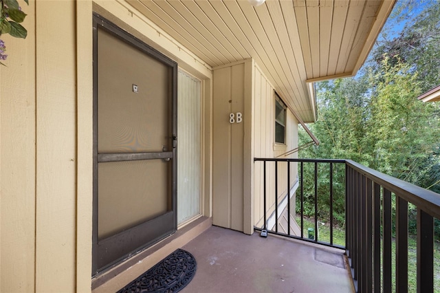 property entrance with a balcony