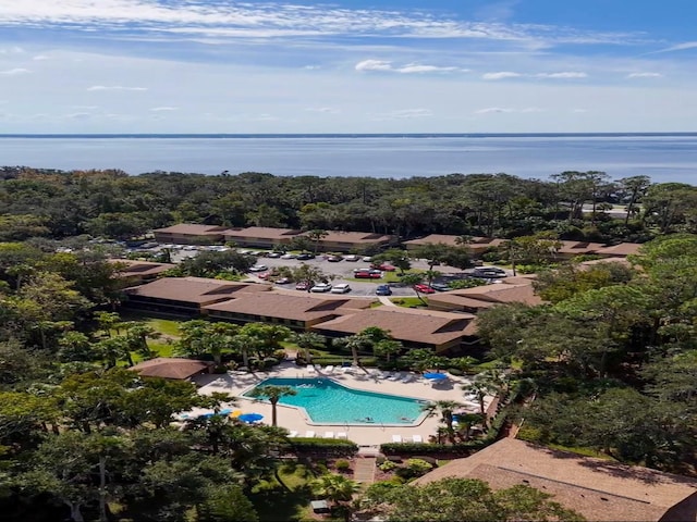 drone / aerial view with a water view