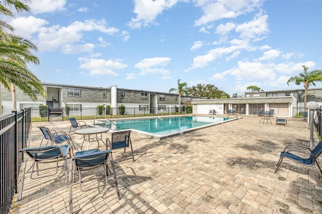 view of pool featuring a patio