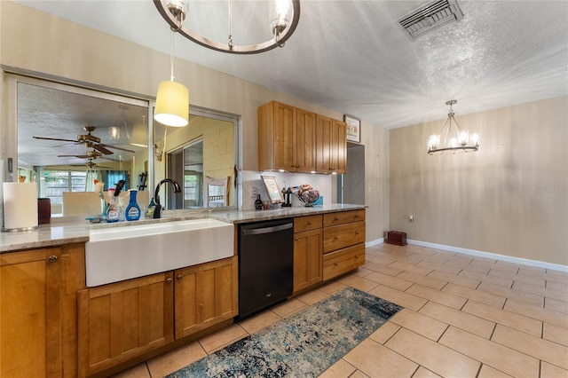 kitchen featuring a textured ceiling, ceiling fan with notable chandelier, sink, pendant lighting, and dishwasher