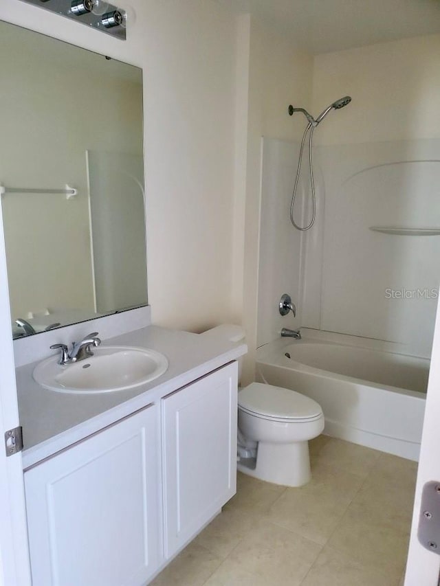 full bathroom with vanity, toilet, and washtub / shower combination