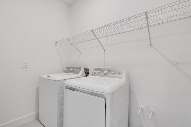 laundry area featuring separate washer and dryer