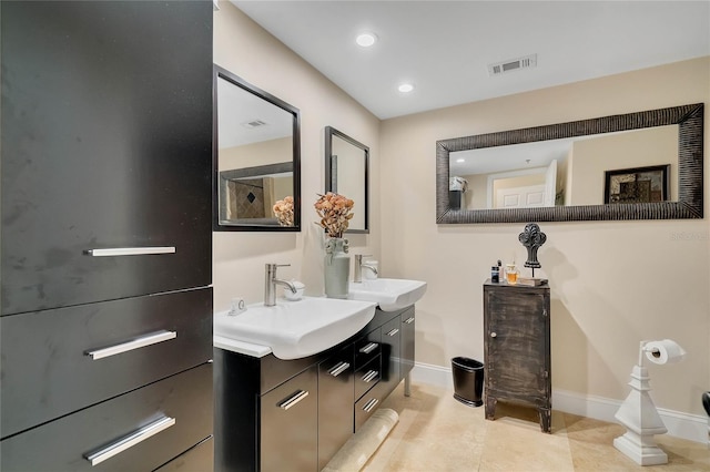 bathroom with vanity and tile patterned floors