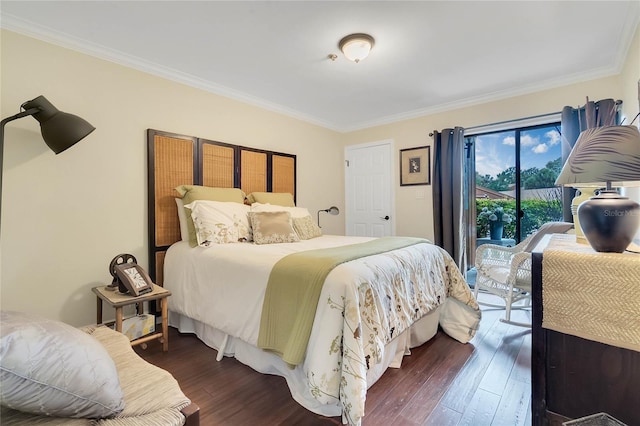 bedroom featuring access to exterior, crown molding, and dark hardwood / wood-style flooring