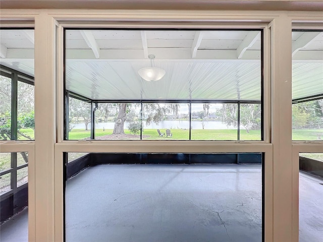 unfurnished sunroom with a wealth of natural light