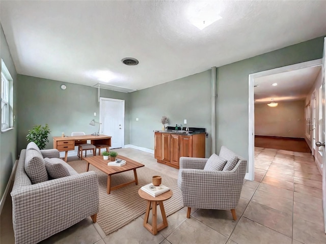 living room featuring light tile patterned floors