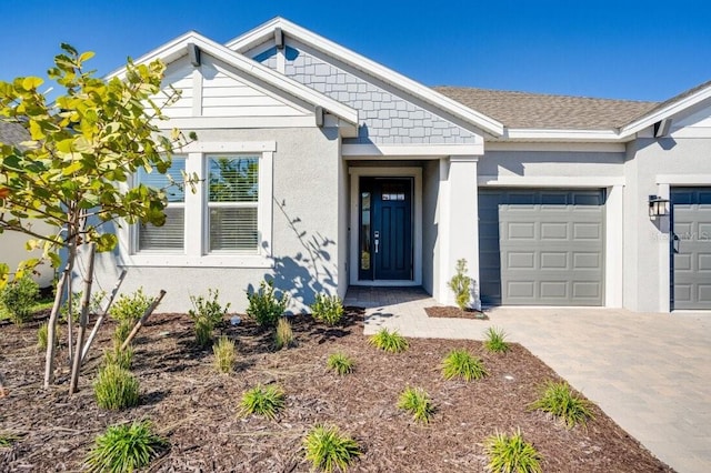 view of front of home with a garage