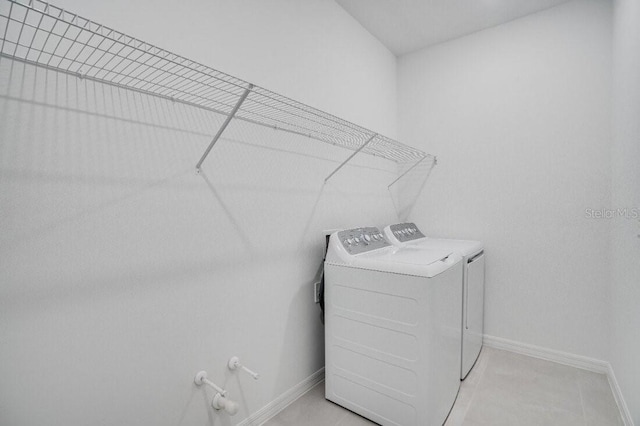 laundry area with washer and clothes dryer