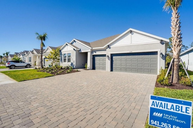 ranch-style home with a garage