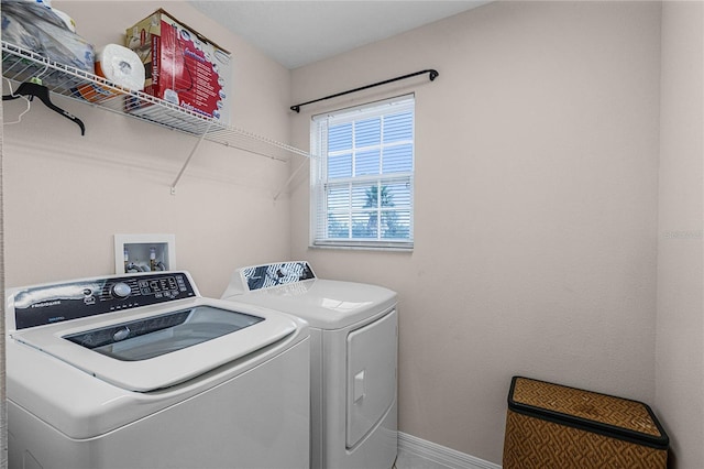 laundry area featuring washer and clothes dryer