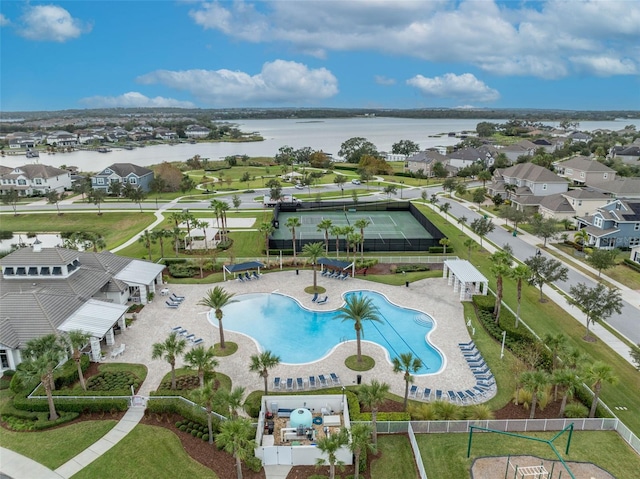 birds eye view of property featuring a water view