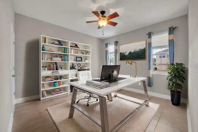 office featuring ceiling fan and light tile patterned flooring