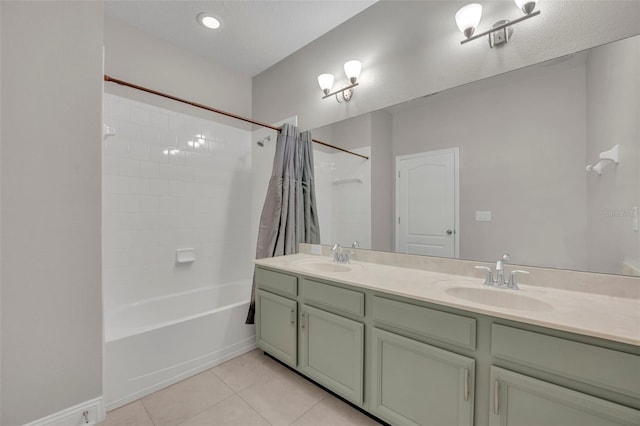 bathroom featuring vanity, tile patterned flooring, and shower / bath combo