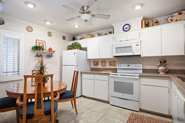 kitchen with white appliances, white cabinetry, ornamental molding, and backsplash