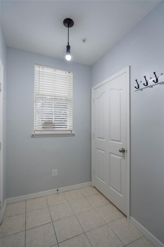 view of tiled spare room