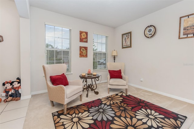 sitting room featuring light tile patterned floors