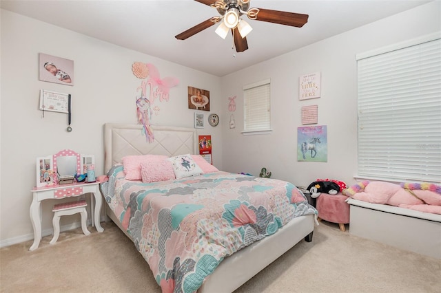 carpeted bedroom with ceiling fan