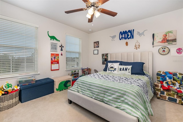 bedroom featuring carpet and ceiling fan