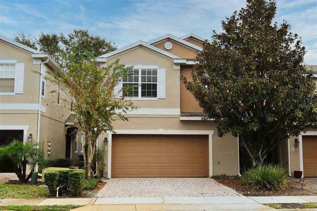 view of front of home with a garage