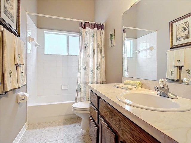 full bathroom with vanity, shower / tub combo with curtain, tile patterned floors, and toilet