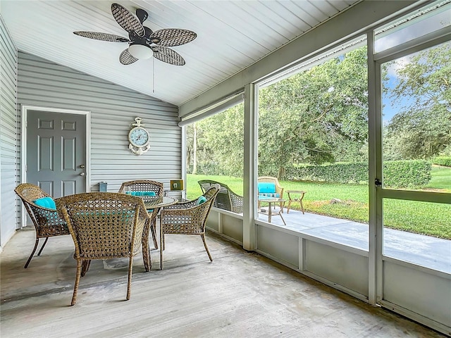 sunroom / solarium with vaulted ceiling and ceiling fan