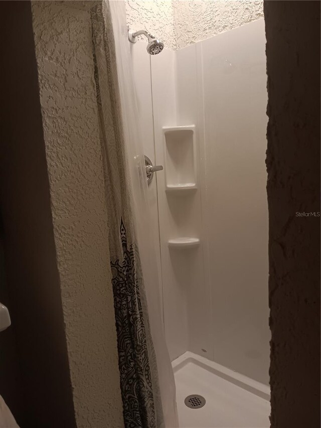 bathroom with walk in shower