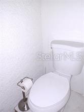 bathroom featuring toilet