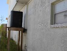 6728 Sea Ranch Dr, Hudson, FL 34667 - view of property exterior with stucco siding