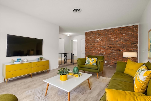 carpeted living room featuring ornamental molding