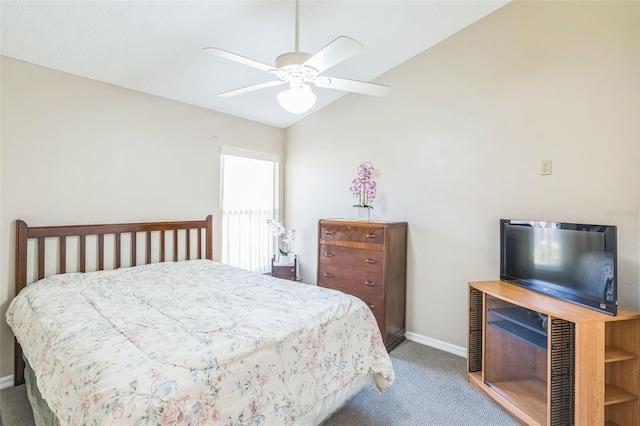 carpeted bedroom featuring ceiling fan and lofted ceiling