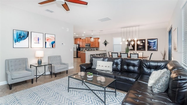 living room with ceiling fan