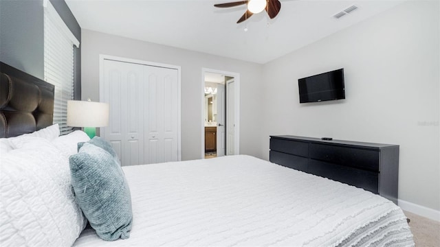 carpeted bedroom with ceiling fan, connected bathroom, and a closet