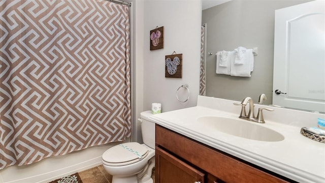 full bathroom featuring tile patterned floors, vanity, shower / bath combination with curtain, and toilet