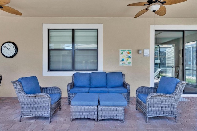 view of patio featuring ceiling fan