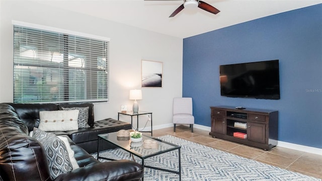 tiled living room featuring ceiling fan