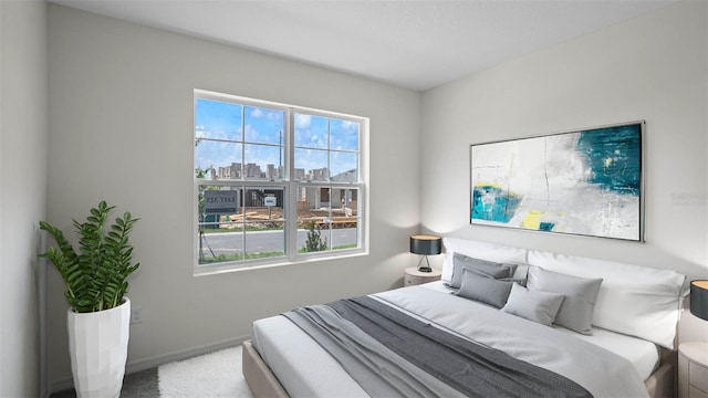 bedroom featuring carpet