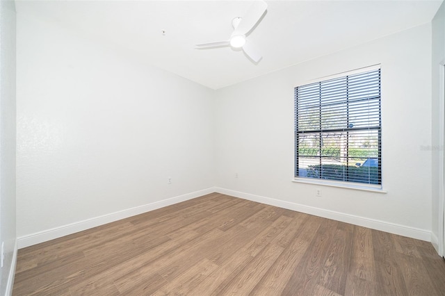 unfurnished room with ceiling fan and light hardwood / wood-style flooring