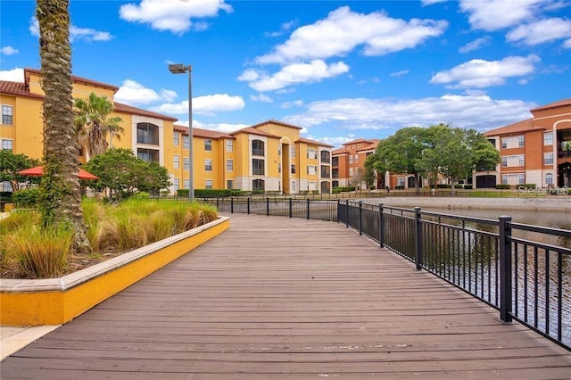 view of community with a water view