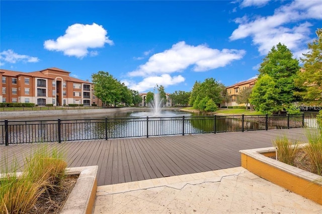 deck featuring a water view