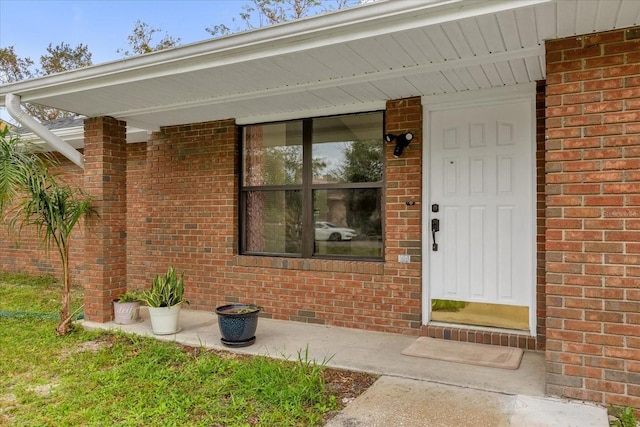 857 S Atmore Cir, Deltona, FL 32725 - doorway to property featuring brick siding