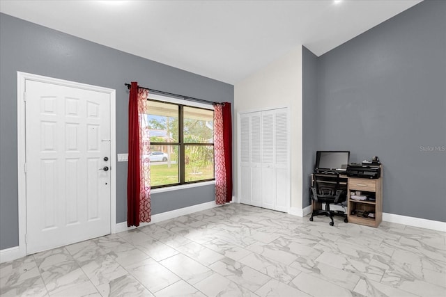 857 S Atmore Cir, Deltona, FL 32725 - entryway featuring marble look tile flooring and vaulted ceiling