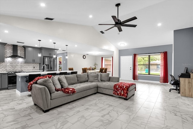857 S Atmore Cir, Deltona, FL 32725 - living room featuring light marble finish floors, recessed lighting, a ceiling fan, and high vaulted ceiling