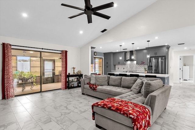 857 S Atmore Cir, Deltona, FL 32725 - living area featuring light marble finish flooring, a ceiling fan, recessed lighting, and lofted ceiling