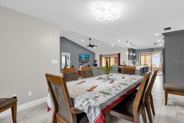857 S Atmore Cir, Deltona, FL 32725 - dining space featuring light marble finish flooring, recessed lighting, ceiling fan, and vaulted ceiling