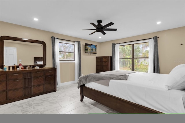 857 S Atmore Cir, Deltona, FL 32725 - bedroom with light marble finish flooring, recessed lighting, and a ceiling fan