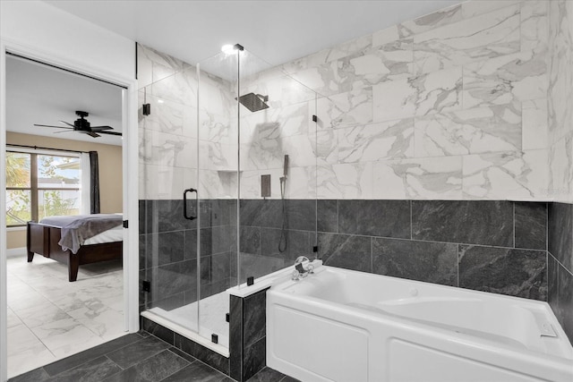 857 S Atmore Cir, Deltona, FL 32725 - bathroom with a bath, marble look tiles, ensuite bath, a stall shower, and ceiling fan