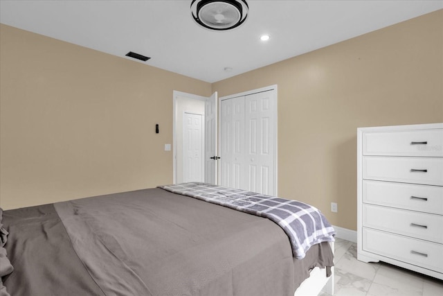 857 S Atmore Cir, Deltona, FL 32725 - bedroom with light marble finish flooring, a closet, and recessed lighting