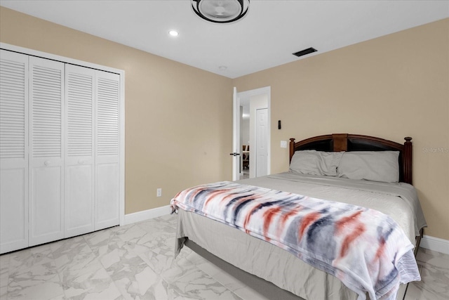857 S Atmore Cir, Deltona, FL 32725 - bedroom with light marble finish floors, recessed lighting, and a closet