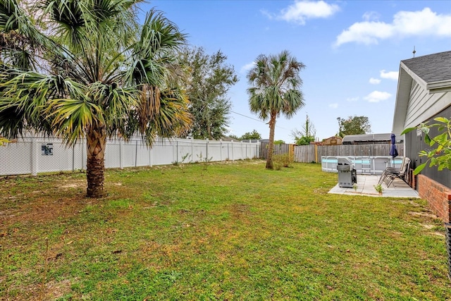 857 S Atmore Cir, Deltona, FL 32725 - fenced backyard with a patio area