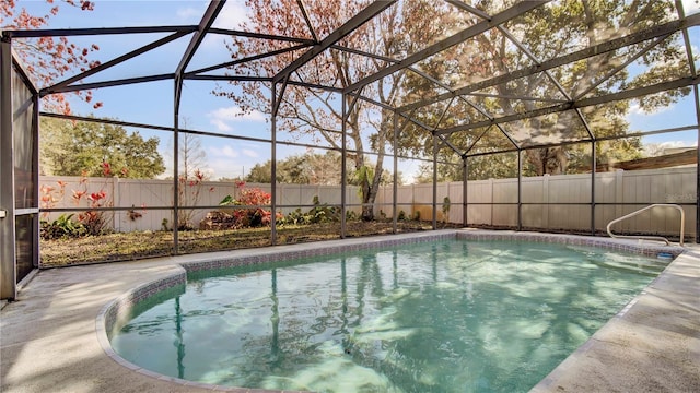 view of pool featuring a lanai and a patio